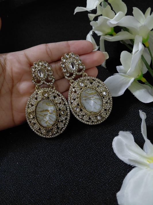 Golden Earrings with White or Blue Oval Stone