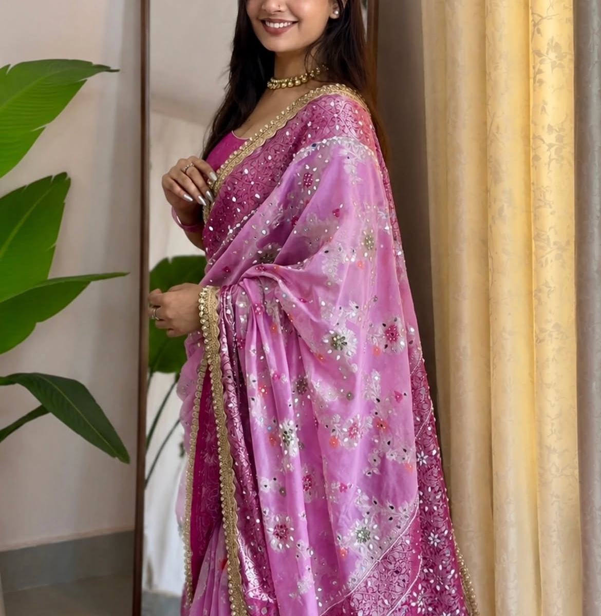 Mauve Banarasi saree stone and mirror floral motif close-up