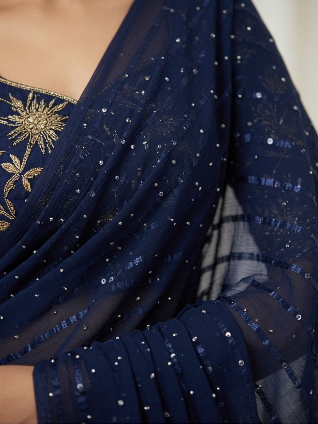 Midnight Blue Chiffon Saree with golden Dot Embellishments & Tassel Pallu