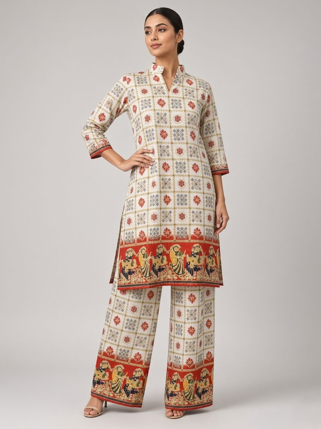 Cream and red printed kurta palazzo set with folk art border – work detail | Saviias Studioz