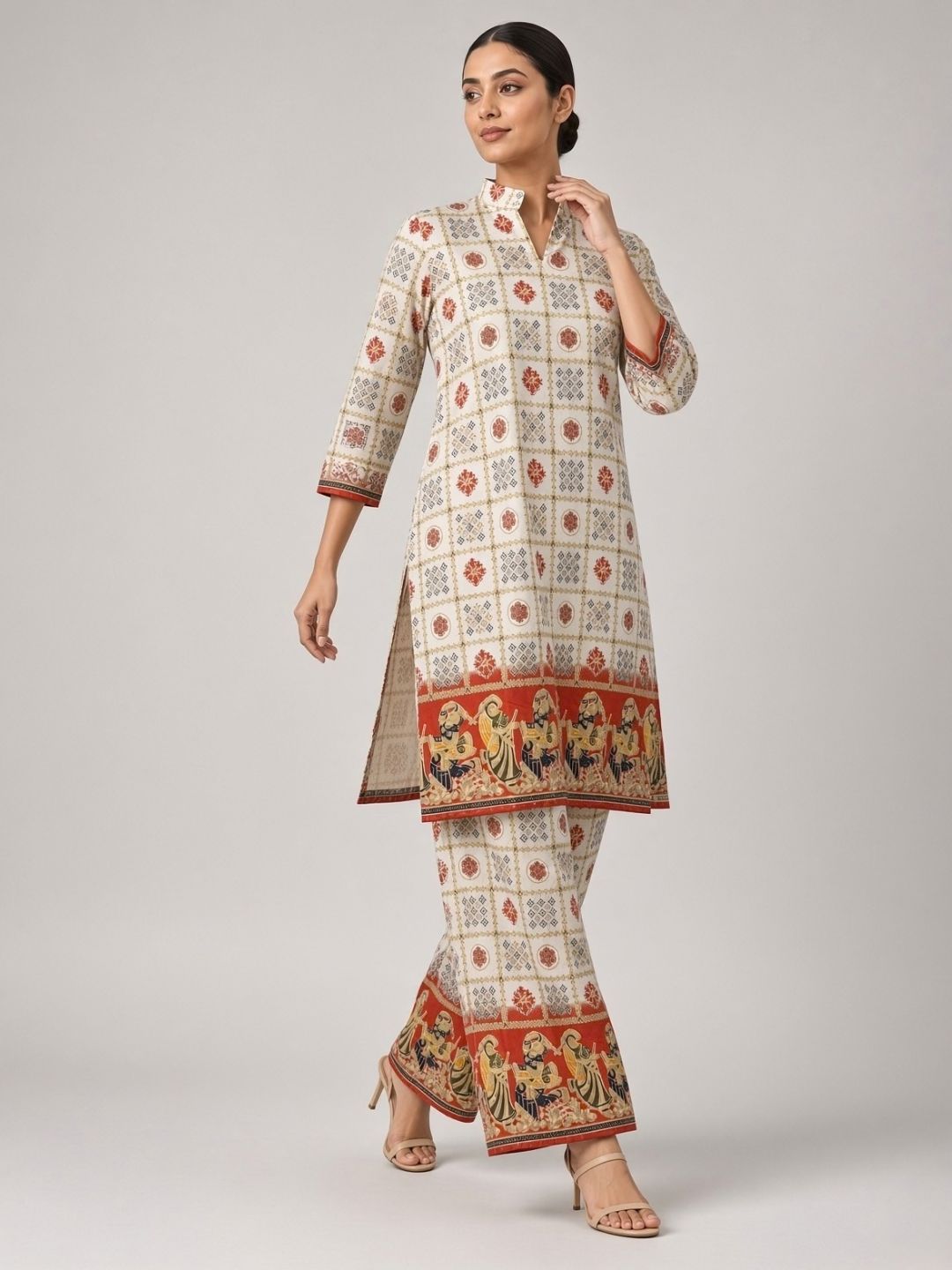 Cream and red printed kurta palazzo set with folk art border | Saviias Studioz
