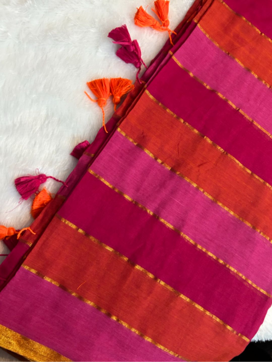 Rani pink and orange striped mul cotton saree with golden zari lines – full drape | Saviias Studioz