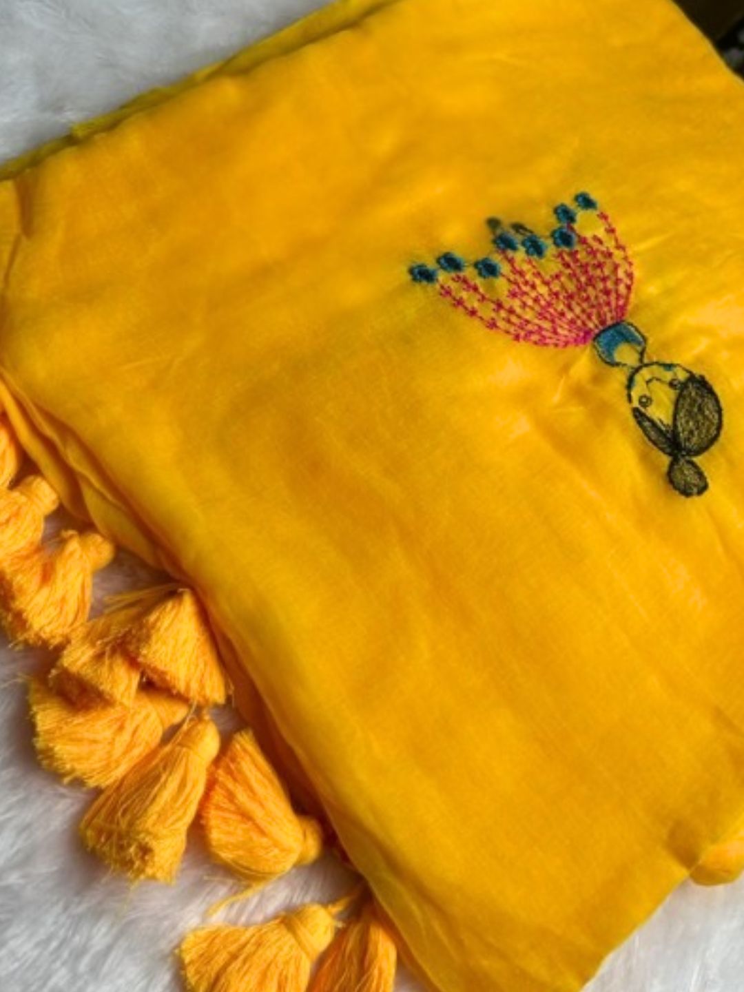 Mustard yellow mul cotton saree with hand-embroidered doll motif | Saviias Studioz
