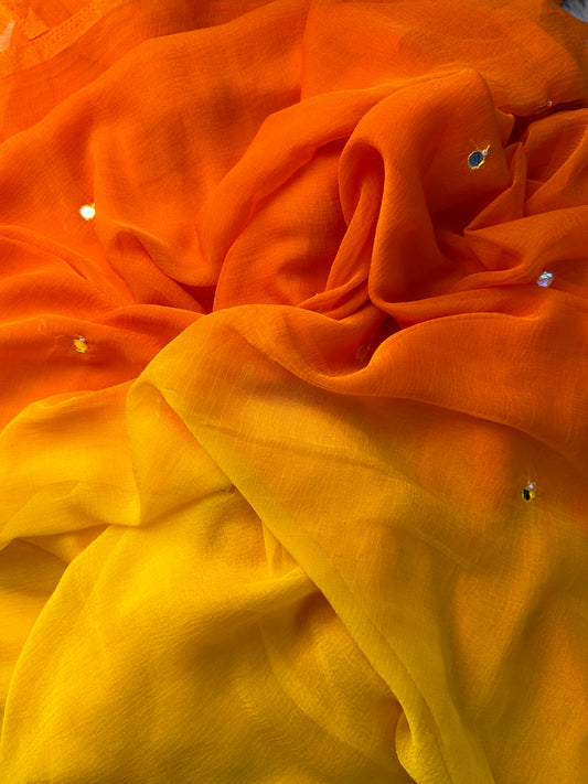 Orange-yellow ombre mirror work saree, draped view