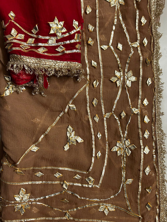 Cheeku gota patti chiffon saree with red contrast blouse, draped view