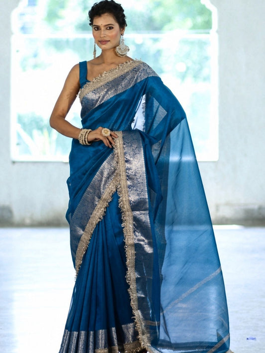 Peacock blue tissue organza saree with Banarasi border and gota lace