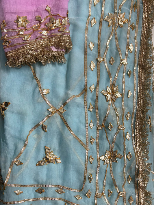 Sky blue gota patti chiffon saree with baby pink blouse, draped view