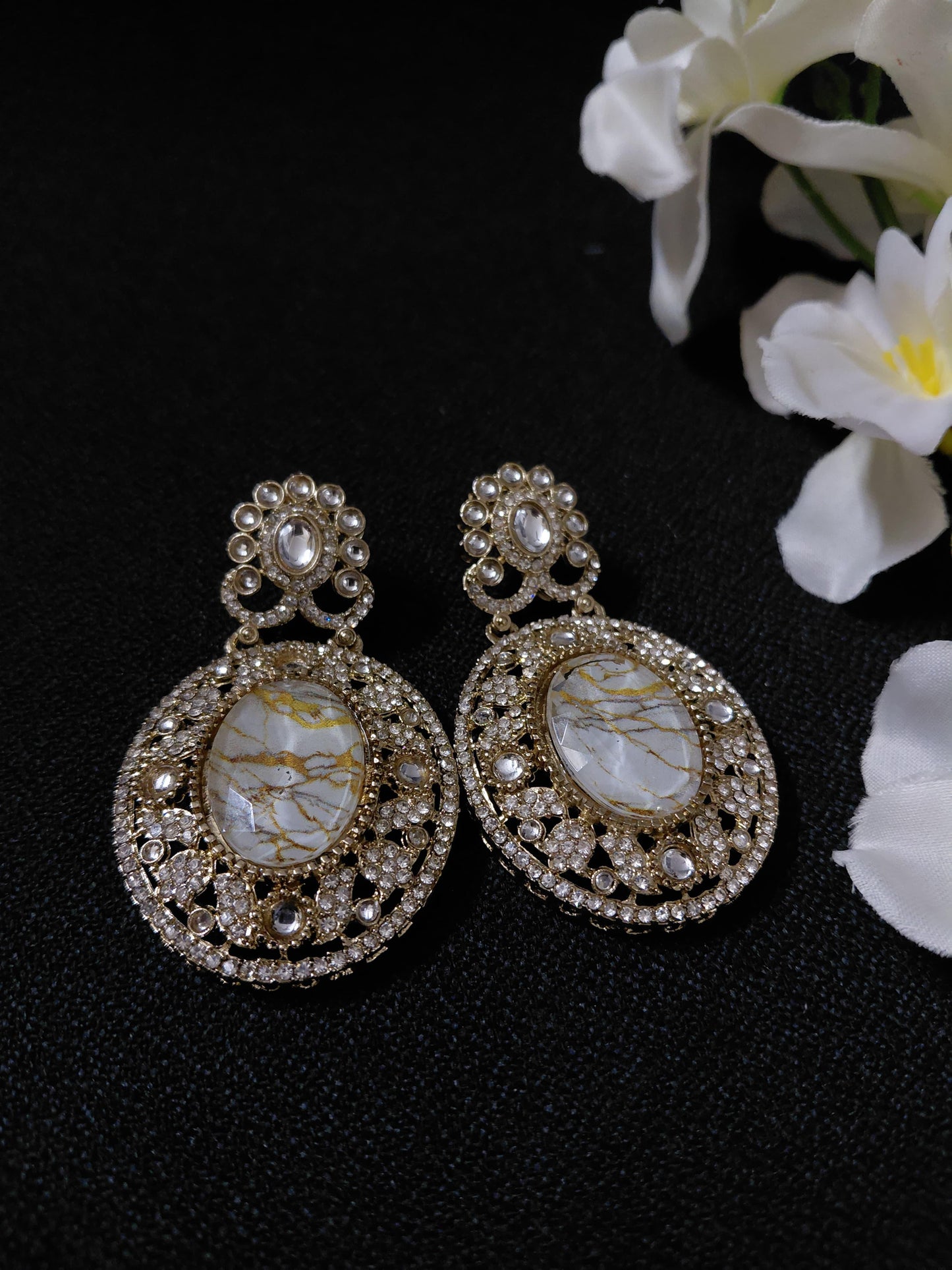 Golden Earrings with White or Blue Oval Stone