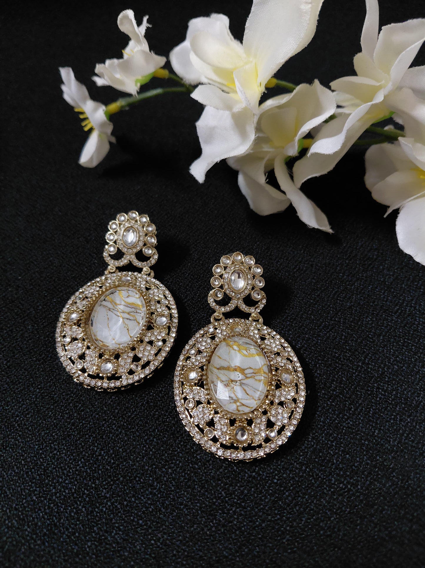 Golden Earrings with White or Blue Oval Stone