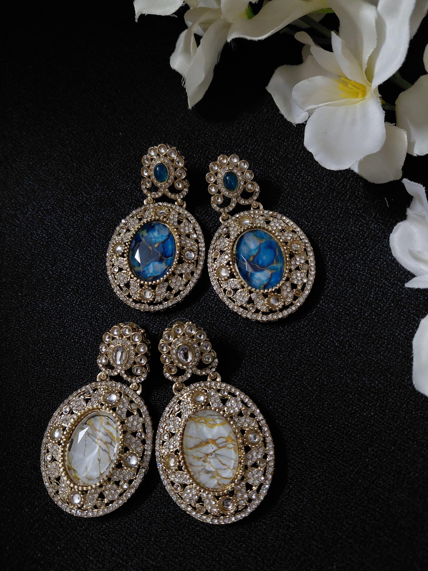 Golden Earrings with White or Blue Oval Stone